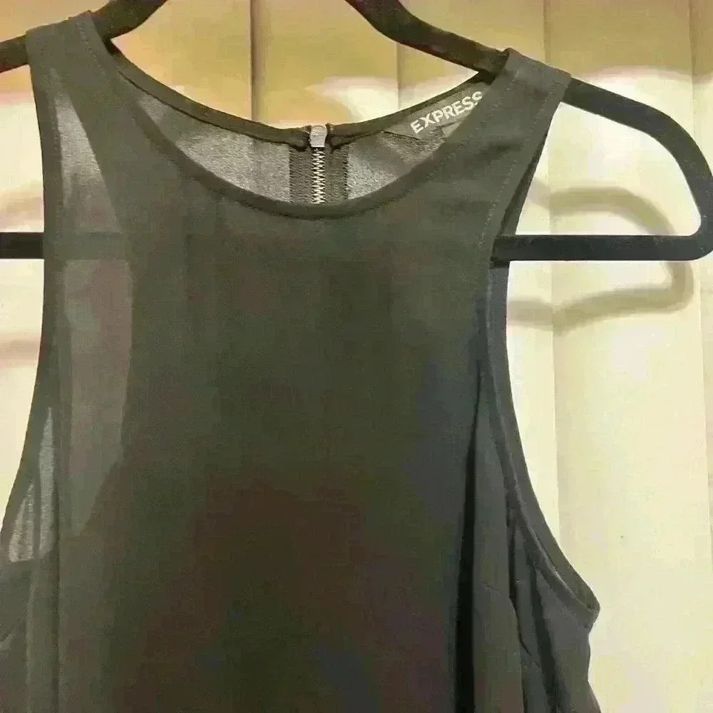 beautiful long black open sided shirt size XS in good condition